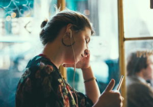 Woman listening to something on headphones